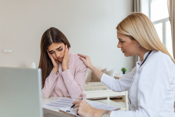 Patient receiving bad news, She is desperate and crying, Doctor support and comforting her patient...