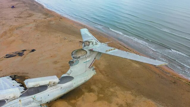 Soviet military aircraft-ekranoplan Lun on the coast of the Caspian Sea. Aerial photography. Dagestan, Derbent.
