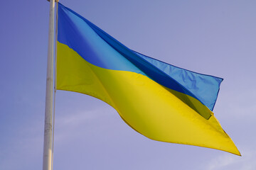 flag ukraine wave sky silk background ukrainian National yellow and blue colors in fabric texture