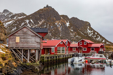 Fototapeta na wymiar Sto Norway 02-28-2022. Fishing boats and fisherman's house called Rorbu at Sto in Vesteralen islands. Norway.
