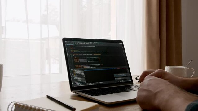 Coding on the screen, HTML encoding and programming on a laptop screen, developer, web development. Computer Web Developer. Cloud data social network media or virus. High quality 4k footage