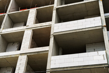 construction of a multi-storey residential building, concrete frame and building materials