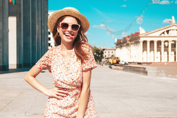 Young beautiful smiling hipster woman in trendy summer clothes. Sexy carefree woman posing on the...