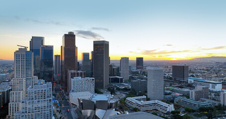 Los Angels downtown skyline, panoramic city skyscrapers, downtown cityscape skyline at sunset.