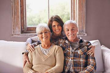 I love my parents. A cropped portrait of a happy senior couple and their adult daughter at home. - Powered by Adobe