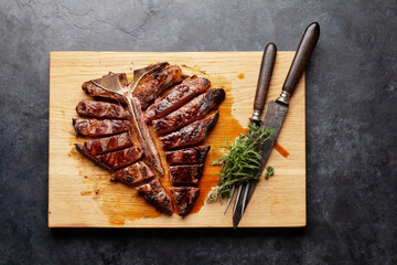Grilled porterhouse beef steak. Sliced T-bone