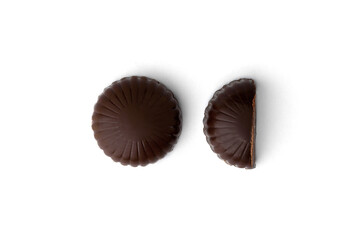 Chocolate sweets with filling isolated on white background.