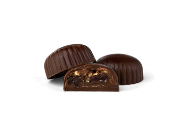 Chocolate sweets with filling isolated on white background.
