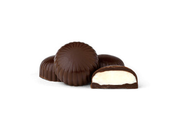 Chocolate sweets with filling isolated on white background.