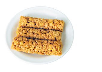 breakfast cereal bars with vitamins on a plate