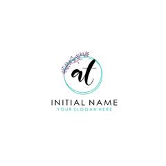 Obraz premium AT Initial letter handwriting and signature logo. Beauty vector initial logo .Fashion boutique floral and botanical