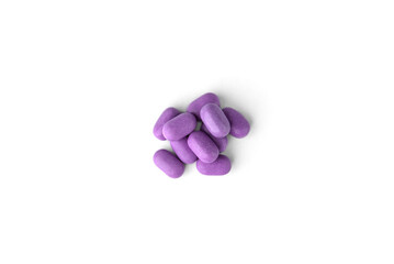 Obraz na płótnie Canvas Colored jelly beans isolated on a white background. Mint dragees with berries flavor.