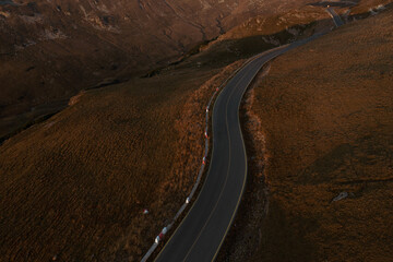 Aerial view of a mountain winding road. Great infrastructure roads of the world.