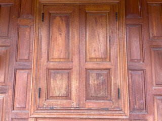 old wooden door with shutters