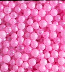 Small sweet pink balloons as a background.