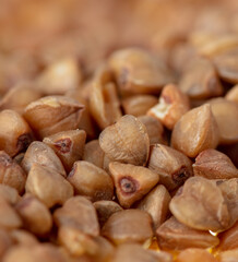 Close-up of buckwheat groats as background.