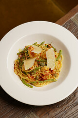 Spaghetti pasta with shrimp, parmesan cheese and green beans