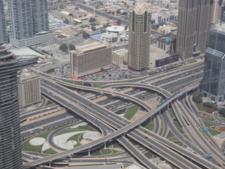 Dubai, UAE- March 31 2022: Interconnected highway interchange in Dubai allows four wheelers and...