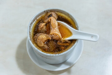 Bull penis stew soup, Dun tang, old fire soup or lou fo tong.Traditional chinese food, canton cuisine or yue cuisine made with meat and Chinese herbs.
