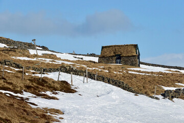An old hut in wintertime in the Westfjorden of Iceland