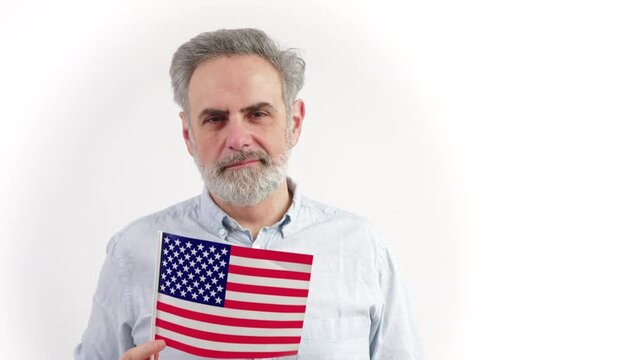 40s caucasian man hiding behing the US flag - portrait isolated on white background. High quality photo