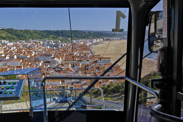 in the elevator that connects the lower part of Nazaré to the sitio in Nazaré