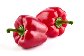 Red ripe bell peppers, isolated on white background.