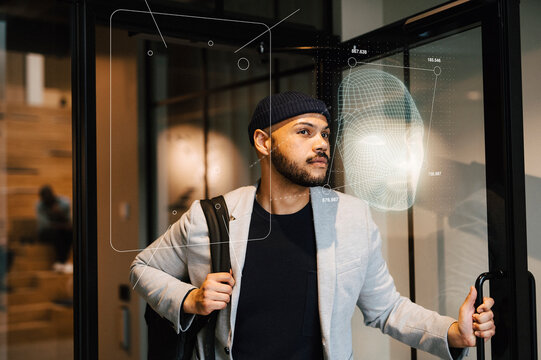 Young businessman leaving office building