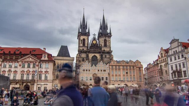 Old town square in Prague timelapse hyperlapse, Tyn Cathedral of the Virgin Mary and monument of Jan Hus.