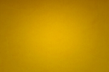 plain mustard yellow wall texture background with vignette