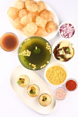 Panipuri or Golgappa is a popular street snack from India. It's a round, hollow puri filled with a mixture of flavoured water and other chat items © SMD IMAGES