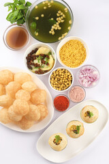 Panipuri or Golgappa is a popular street snack from India. It's a round, hollow puri filled with a mixture of flavoured water and other chat items