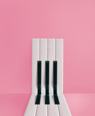 Minimal aesthetic composition of piano keys arranged in an abstract, rectangular shape on an isolated pastel pink background. Music creative card. Door or entrance concept. © jbuinac