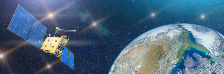 Wide panoramic view of outer space with planet earth and communication satellite naf one starry background. Elements of this image furnished by NASA.