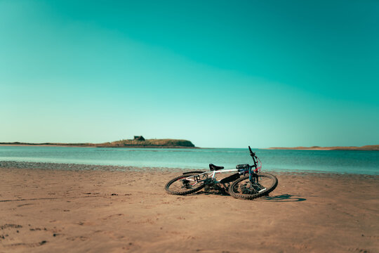 Abandoned bike on an empty beach in Strandhill, Ireland
