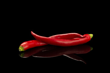 Fresh Hot red pepper isolated on a black background. Food concept. Ingredient for fresh spice...