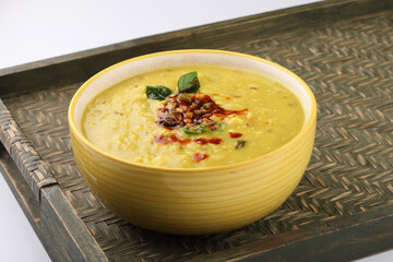 Indian popular food Dal fry or traditional Dal Tadka Curry or yellow lentil curry