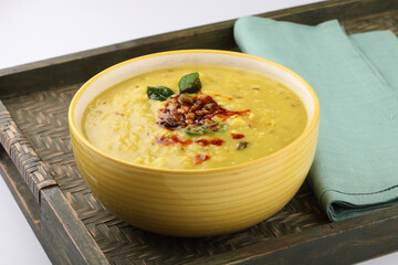 Indian popular food Dal fry or traditional Dal Tadka Curry or yellow lentil curry