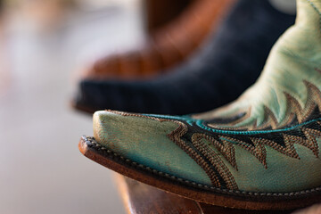 Closeup of a cowboy boot on a blurred background