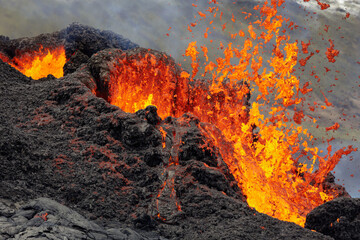 Red lava spitted from crater