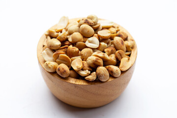 Roasted peanuts on white background.