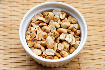 Roasted peanuts in white cup