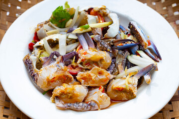 spicy green mango salad with blue crab