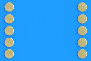 Frame of golden metal heads of nails on blue background. Building equipment. Luxury tool for repair, renovation. Expensive repairs. Top view. Copy space. 3d render