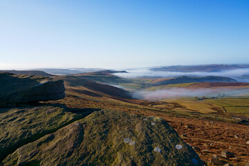 Down the mist filled valleys of Derbyshire from high on Stanage Edge
