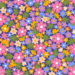 Seamless floral pattern on a blue background. Textile design with flowers in abstract style. Repeatable botanical background. Summer flat illustration.