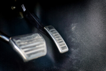 Sporty design of the steel pedals with rubber anti-slip surfaces of an automatic transmission car