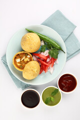 paneer bonda indian snack,Indian snack aloo vada or bonda made from potato with coconut chutney. indian snacks Aloo Bonda vada / pakoda / pakora. Served with green chutney.