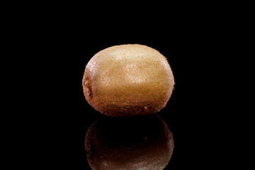 Kiwi fruit on a black background in. Close up of fresh and tasty kiwi, studio shot.