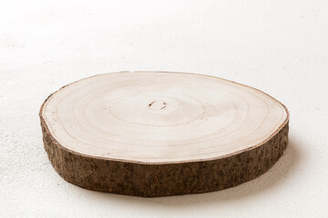 Perspective view of wooden serving tray on cement background. Empty space for your design